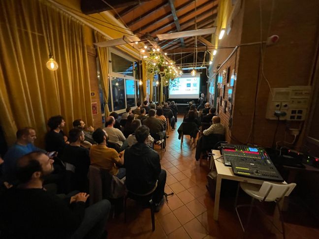 The location and the audience during the presentation of the Dev Romagna group
