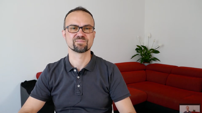 Andrea Verlicchi sitting in his living room, during the talk