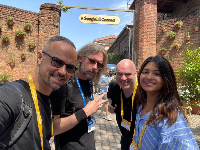 A selfie with me, Jeremy Wagner, Fabian Krumbholz, and Nishu Goel in front of the main street of the Google I/O Connect venue